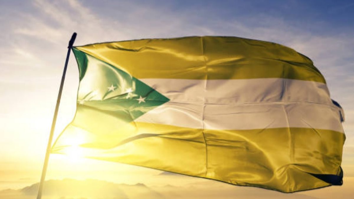 Panama Oeste Province of Panama flag on flagpole textile cloth fabric waving on the top sunrise mist fog